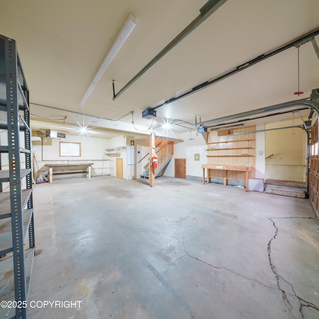 7621 E 4th Ave, Anchorage, AK 99504 - garage featuring a garage door opener