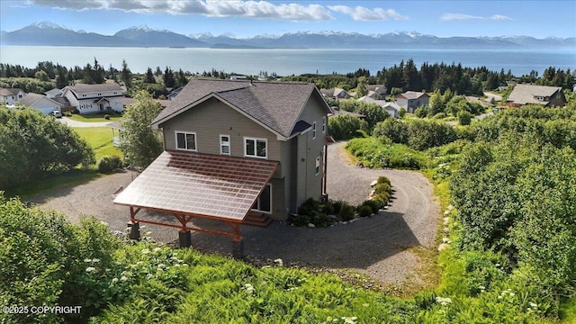 3866 Cabana Ct, Homer, AK 99603 - back of property featuring driveway, a water and mountain view, and a shingled roof