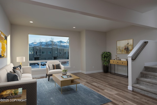 3680 Little Bear Pl # 8, Anchorage, AK 99504 - living room with wood finished floors, stairway, baseboards, and recessed lighting