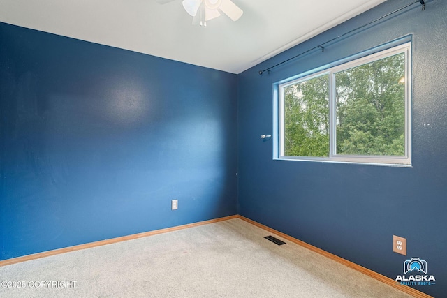 19306 Second St, Eagle River, AK 99577 - unfurnished room with a ceiling fan, carpet, and baseboards