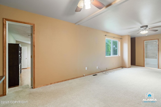 19306 Second St, Eagle River, AK 99577 - spare room with ceiling fan, light carpet, and baseboards