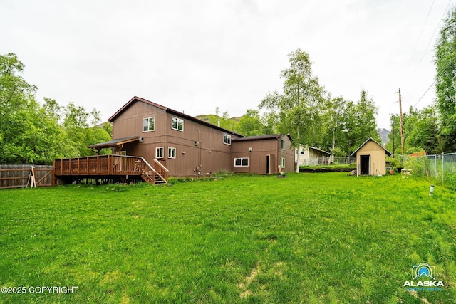 19306 Second St, Eagle River, AK 99577 - view of yard with a wooden deck and an outdoor structure