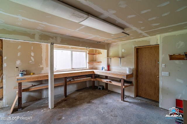 19306 Second St, Eagle River, AK 99577 - below grade area with a workshop area