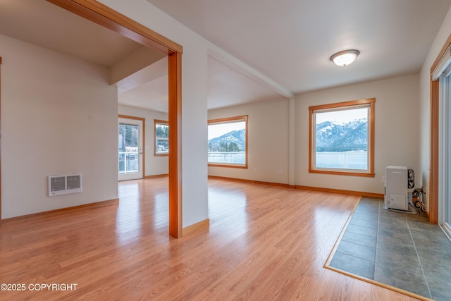 5751 N Tongass Hwy, Ketchikan, AK 99901 - interior space with wood finished floors, baseboards, and visible vents