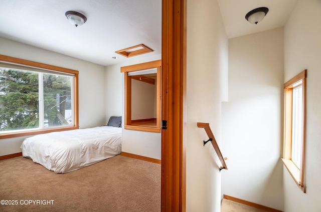 5751 N Tongass Hwy, Ketchikan, AK 99901 - bedroom featuring carpet, attic access, and baseboards