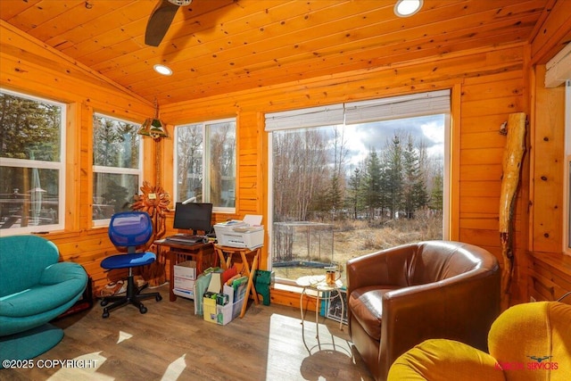16500 E Smith Rd, Palmer, AK 99645 - interior space featuring wood finished floors, wood walls, a ceiling fan, and lofted ceiling