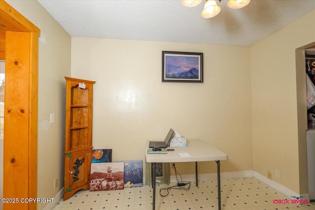 16500 E Smith Rd, Palmer, AK 99645 - office with a textured ceiling, tile patterned floors, and baseboards