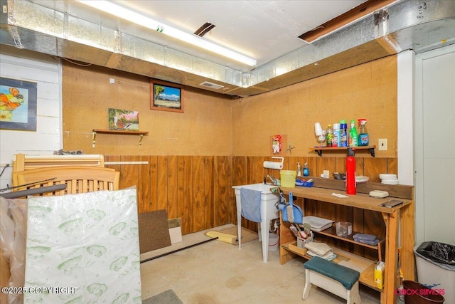 16500 E Smith Rd, Palmer, AK 99645 - misc room with concrete floors, wood walls, and visible vents