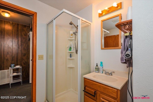 16500 E Smith Rd, Palmer, AK 99645 - full bath featuring vanity, a stall shower, and visible vents