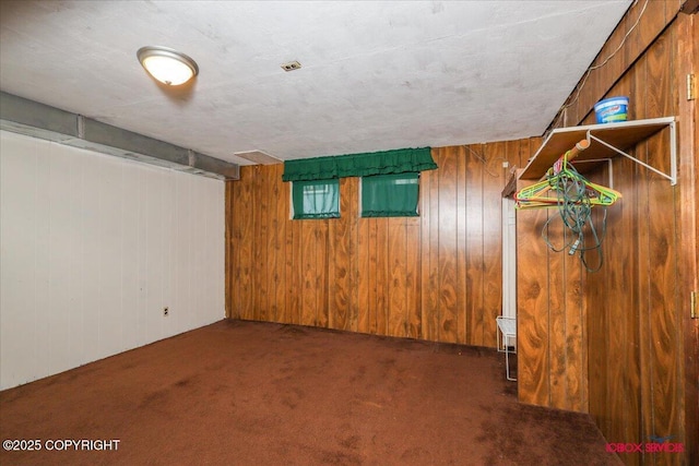 16500 E Smith Rd, Palmer, AK 99645 - finished below grade area featuring carpet floors and wood walls