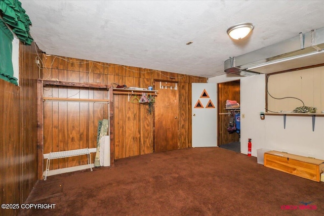16500 E Smith Rd, Palmer, AK 99645 - basement featuring carpet flooring and wood walls