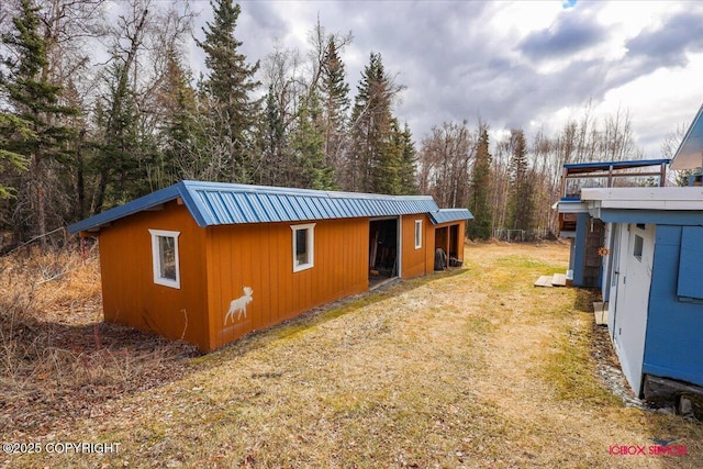 16500 E Smith Rd, Palmer, AK 99645 - view of outbuilding with an outbuilding and a wooded view