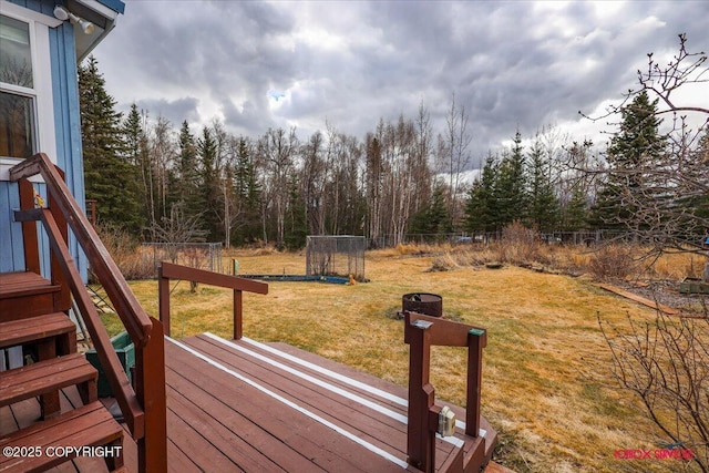 16500 E Smith Rd, Palmer, AK 99645 - wooden terrace featuring a lawn and fence
