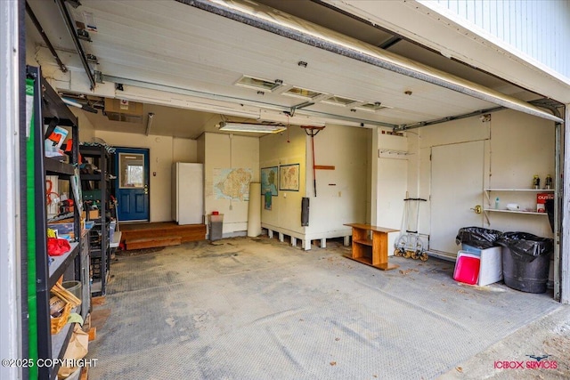 16500 E Smith Rd, Palmer, AK 99645 - garage featuring freestanding refrigerator