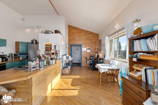 65265 Knob Hill Rd, Anchor Point, AK 99556 - interior space with light wood-style flooring and high vaulted ceiling