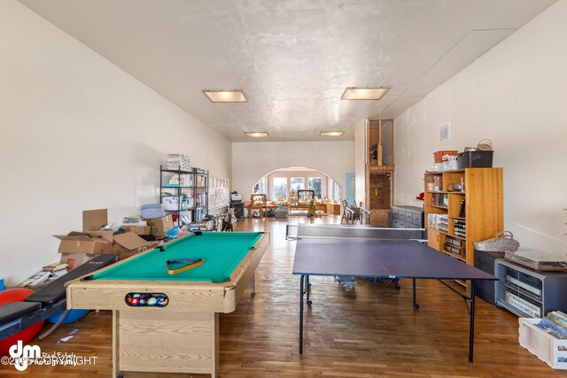 65265 Knob Hill Rd, Anchor Point, AK 99556 - game room featuring arched walkways, visible vents, billiards, and wood finished floors