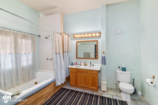 65265 Knob Hill Rd, Anchor Point, AK 99556 - bathroom with tile patterned flooring, vanity, shower / bath combination with curtain, and toilet