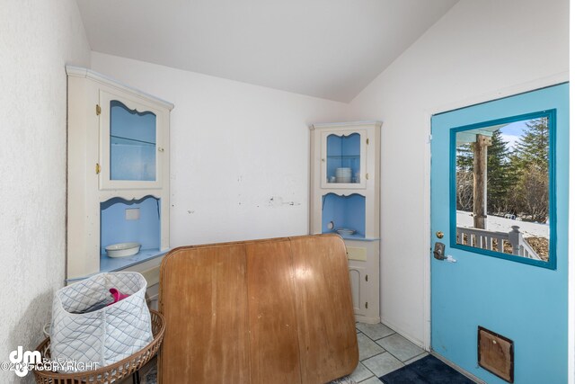 65265 Knob Hill Rd, Anchor Point, AK 99556 - interior space with light tile patterned floors and lofted ceiling