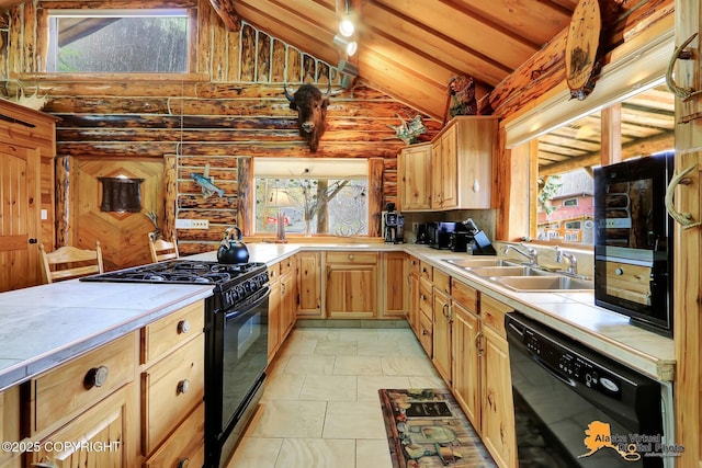 kitchen featuring tile counters, black appliances, high vaulted ceiling, a sink, and light brown cabinetry