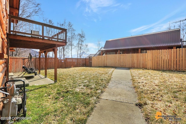 view of yard with a fenced backyard