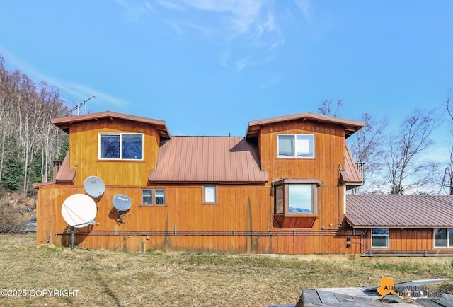 exterior space with metal roof