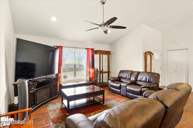 3762-3768 S Lansing Rd, Wasilla, AK 99654 - living area with vaulted ceiling, a ceiling fan, and wood finished floors