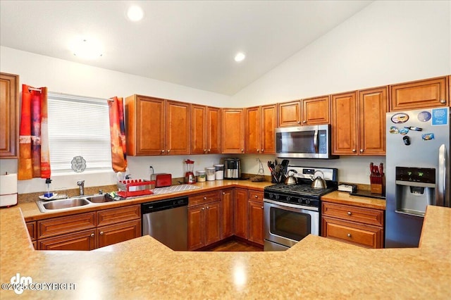 3762-3768 S Lansing Rd, Wasilla, AK 99654 - kitchen featuring appliances with stainless steel finishes, a sink, light countertops, lofted ceiling, and recessed lighting