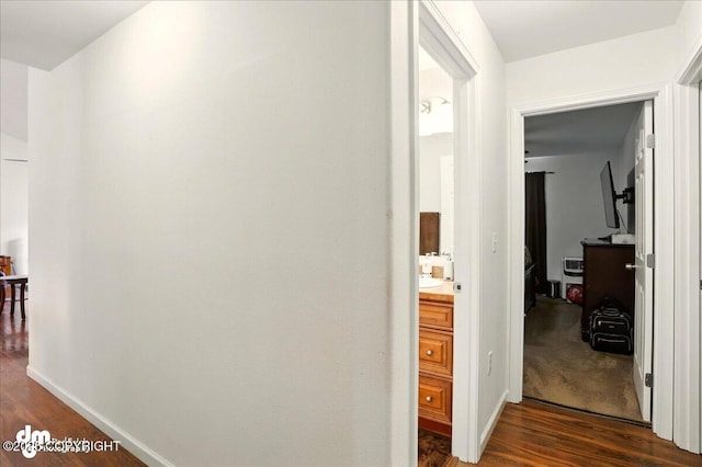3762-3768 S Lansing Rd, Wasilla, AK 99654 - hall featuring dark wood-style flooring and baseboards