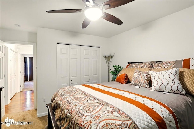 3762-3768 S Lansing Rd, Wasilla, AK 99654 - bedroom with light carpet, a closet, and a ceiling fan