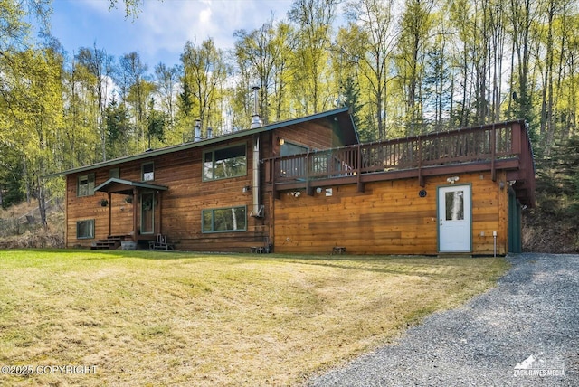 21440 Falling Water Cir, Eagle River, AK 99577 - view of front of house with a front yard, a deck, and entry steps