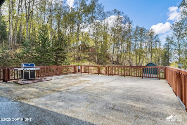 21440 Falling Water Cir, Eagle River, AK 99577 - wooden terrace with a grill