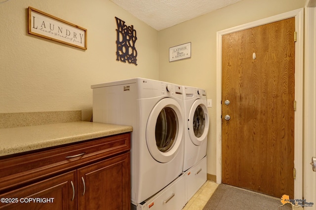 2500 Maylen Cir, Anchorage, AK 99516 - laundry area featuring washing machine and dryer and a textured ceiling