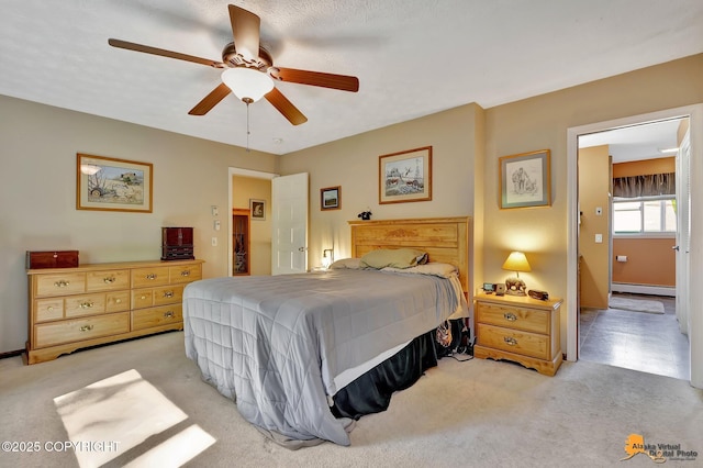 2500 Maylen Cir, Anchorage, AK 99516 - bedroom featuring a baseboard radiator, light colored carpet, and a ceiling fan