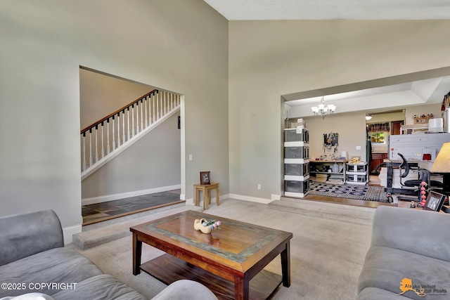 2500 Maylen Cir, Anchorage, AK 99516 - living room with a chandelier, stairs, and baseboards