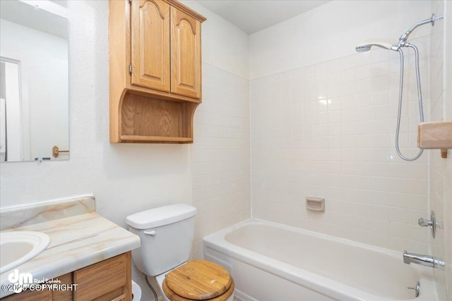 315 Krane Dr # 19, Anchorage, AK 99504 - bathroom featuring toilet, vanity, and bathing tub / shower combination