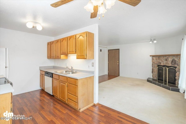 315 Krane Dr # 19, Anchorage, AK 99504 - kitchen with a stone fireplace, dishwashing machine, ceiling fan, and a sink