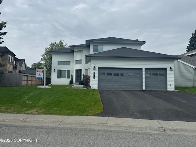 7512 Setter Dr, Anchorage, AK 99502 - view of front facade featuring a garage and driveway
