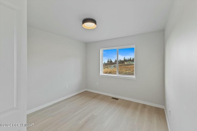1029 Shelley Ave, Homer, AK 99603 - empty room featuring light wood-style floors and baseboards