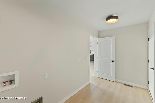 1029 Shelley Ave, Homer, AK 99603 - laundry area featuring washer hookup and light wood finished floors