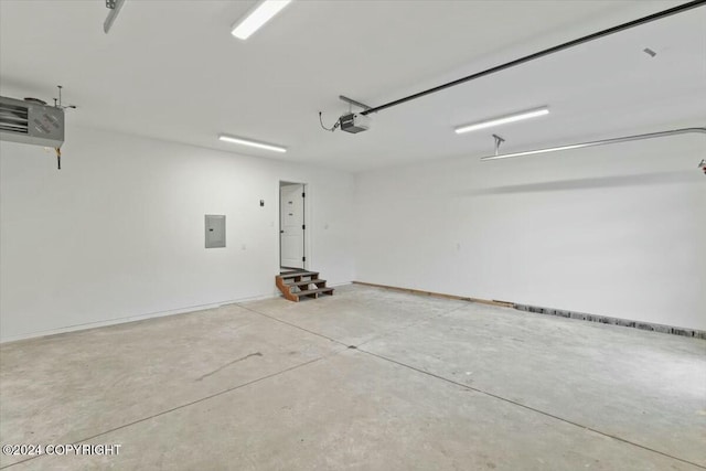 1029 Shelley Ave, Homer, AK 99603 - garage with electric panel and a garage door opener