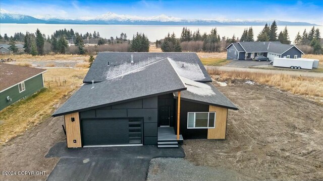 1029 Shelley Ave, Homer, AK 99603 - view of front of property featuring driveway, a shingled roof, and an attached garage