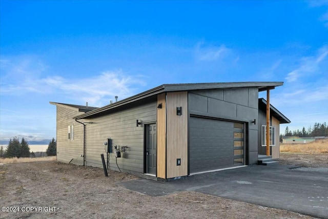 1029 Shelley Ave, Homer, AK 99603 - garage with asphalt driveway