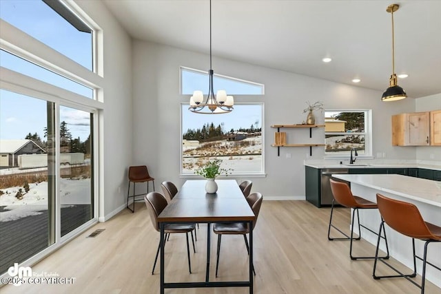 1029 Shelley Ave, Homer, AK 99603 - dining area featuring light wood-style floors, plenty of natural light, a chandelier, and recessed lighting