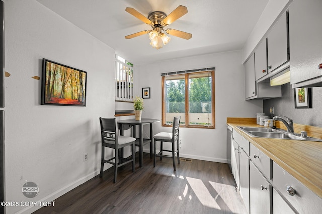 3141 W 35th Ave # 6A3A, Anchorage, AK 99517 - kitchen with dark wood-style flooring, light countertops, and a ceiling fan