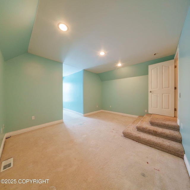 basement featuring recessed lighting, carpet, visible vents, and baseboards