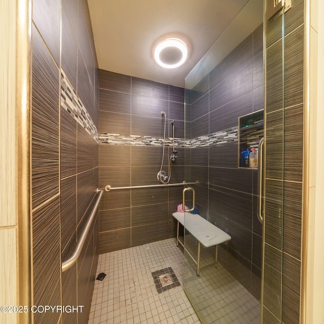 bathroom with a shower stall
