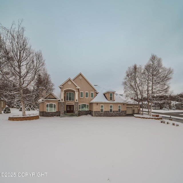 view of front of home featuring stone siding