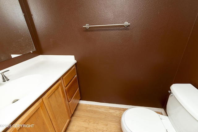 10127 Crest View Ln, Eagle River, AK 99577 - bathroom with vanity, baseboards, and toilet