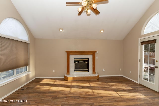 10127 Crest View Ln, Eagle River, AK 99577 - unfurnished living room with a fireplace, a ceiling fan, wood finished floors, and lofted ceiling