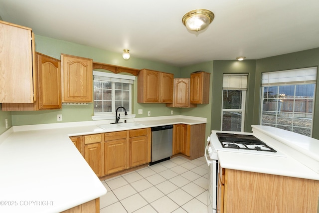 10127 Crest View Ln, Eagle River, AK 99577 - kitchen featuring dishwasher, light countertops, a sink, and gas range gas stove